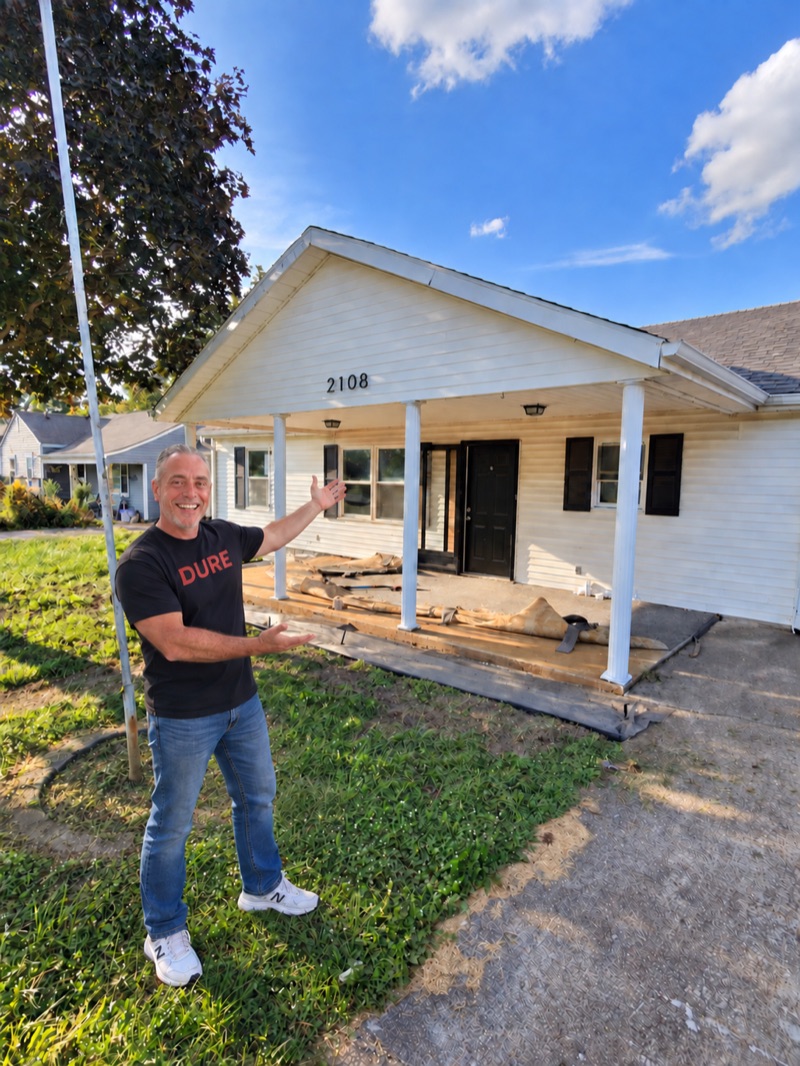 David Upchurch, owner of DURE, in front of the Muncie house he grew up in